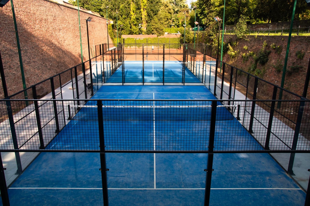 Padel 956 outdoor courts with glass enclosures